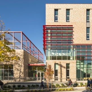 Exterior of Seattle Academy of Arts and Sciences Middle School on a sunny day.