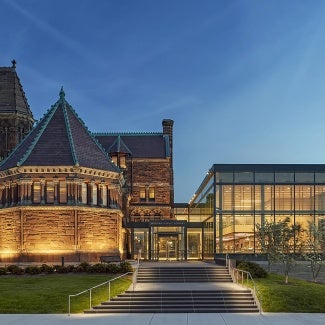 Exterior of Woburn Public Library at dusk.