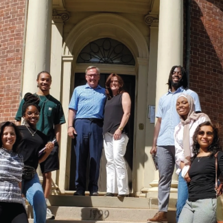 Students from AIA HBCU internship program pose in front of Octagon