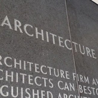 Etched wall at AIA headquarters with names of Firm Award winners