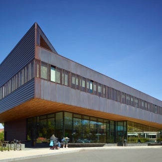 The upper level houses the offices for the franklin regional transit authority and the franklin regional council of governments. the design optimizes massing, material selections, and on-site renewable energy.
