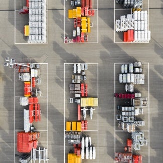 Plastic and metal ware for construction viewed from above at a depot.