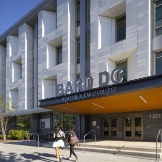 The transformed façade features color and texture variances, chamfered windows that allow for more natural daylight, and a high-performance building envelope.