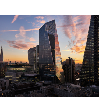 London's financial district skyline at sunset.