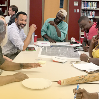 AIA Members sitting around a table