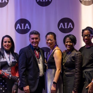 AIA board of directors in front of branded step and repeat