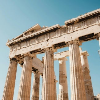 Ancient Greece Parthenon temple against blue sky