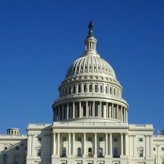 US Capitol building under a blue sky