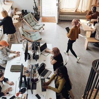 Overhead view of people working in an office