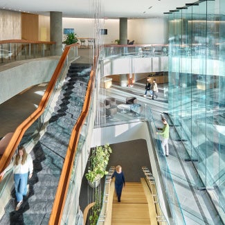 Sun shining through glass windows at AIA Global Campus