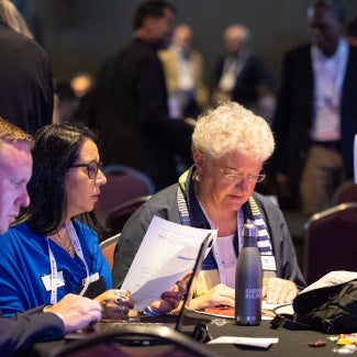 Leaders at the 2025 business meeting