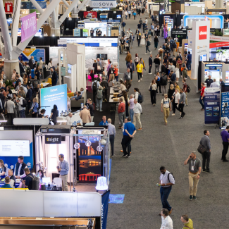 image of conference floor filled with attendees at the architecture expo