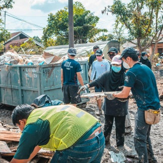 image of community gathering after disaster