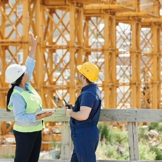 image of architects going over project designs