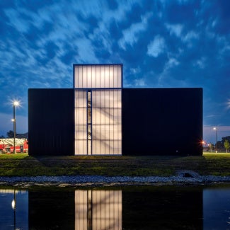 Marion Fire Station No. 1: A training stair that doubles as a hose drying station is illuminated from the inside out.