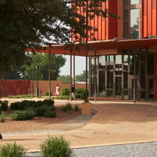 US Embassy Niamey, Niger:The building was designed to reflect regional colors and materials and was sited to take advantage of an existing culturally significant Baobab tree that marks the formal entry to the Chancery building for diplomatic visitors.