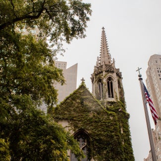 church spire among city skyline