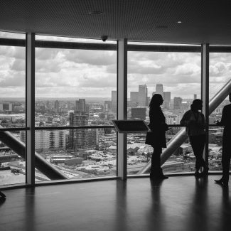 Business people overlooking a city