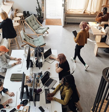 Overhead view of people working in an office